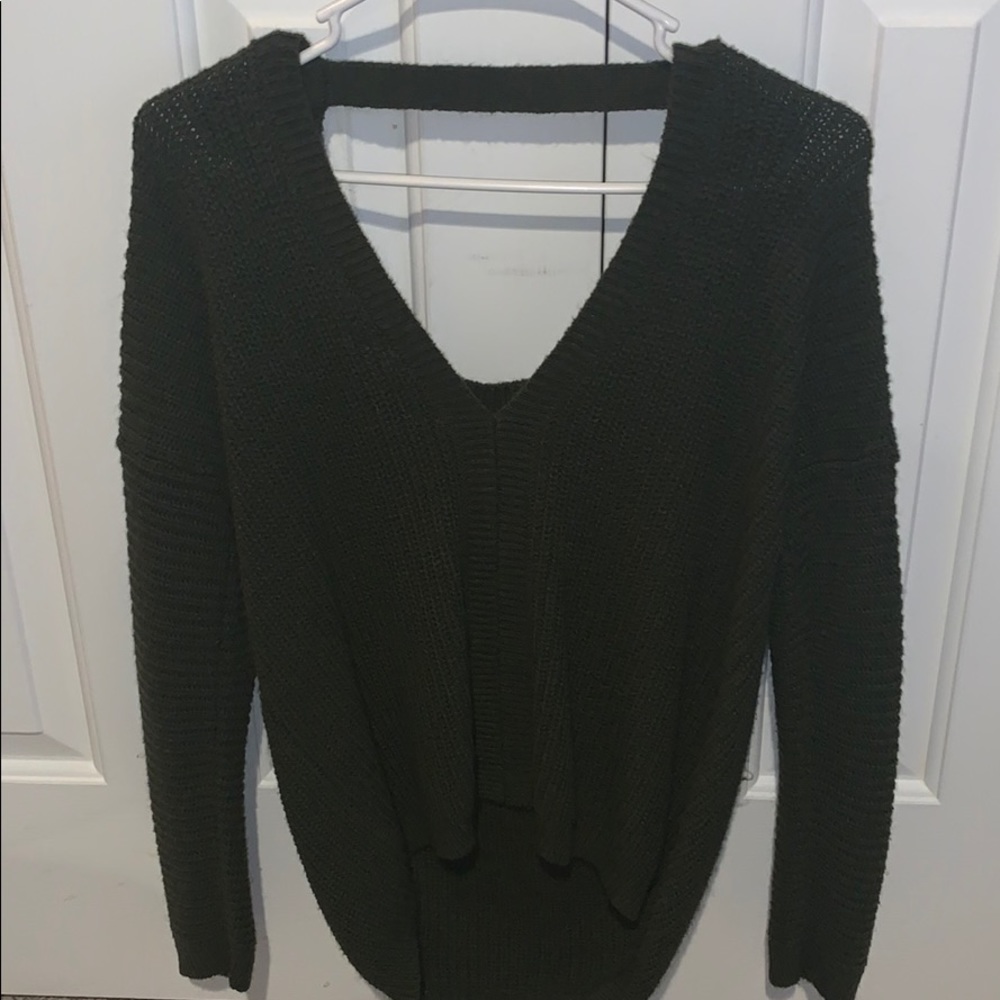 Hunter green sweater.